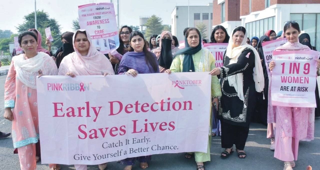 walk Dr Beenish Israr leading the breast cancer awareness walk at the University of Agriculture Faisalabad