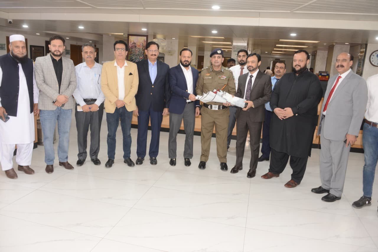 CPO Chamber of Commerce visit bouquet presentation