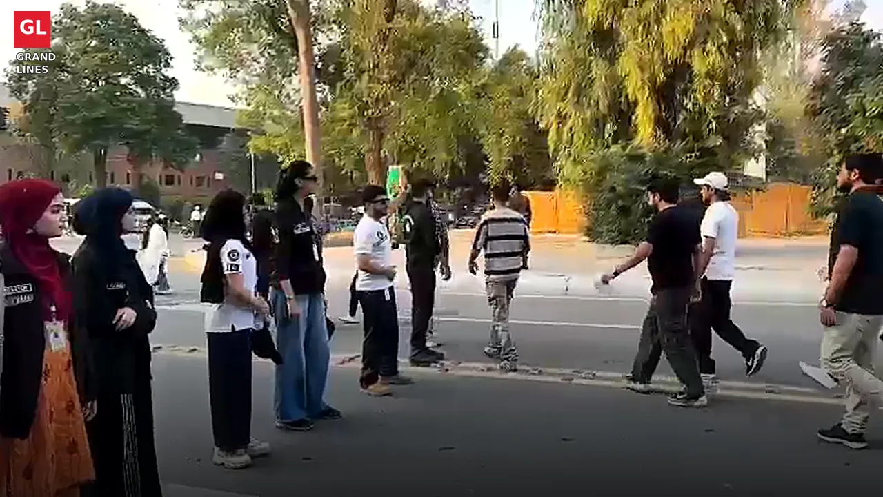 Student volunteers on duty outside Gaddafi Stadium, guiding fans arriving for the tri-series final. Student volunteers on duty outside Gaddafi Stadium, guiding fans arriving for the tri-series final.