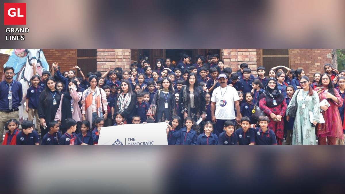 Students pose for a group photo during a visit to the Lyallpur Museum in Faisalabad
