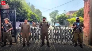 Lahore police personnel stand guard outside Gaddafi Stadium as more than 6,000 officers secure the Pakistan-Sri Lanka tri-series final.