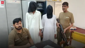 Faisalabad police arrests: two accused in custody with officers.
