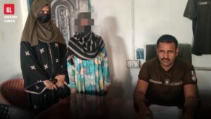Police officials with a woman accused in a drug case in Faisalabad