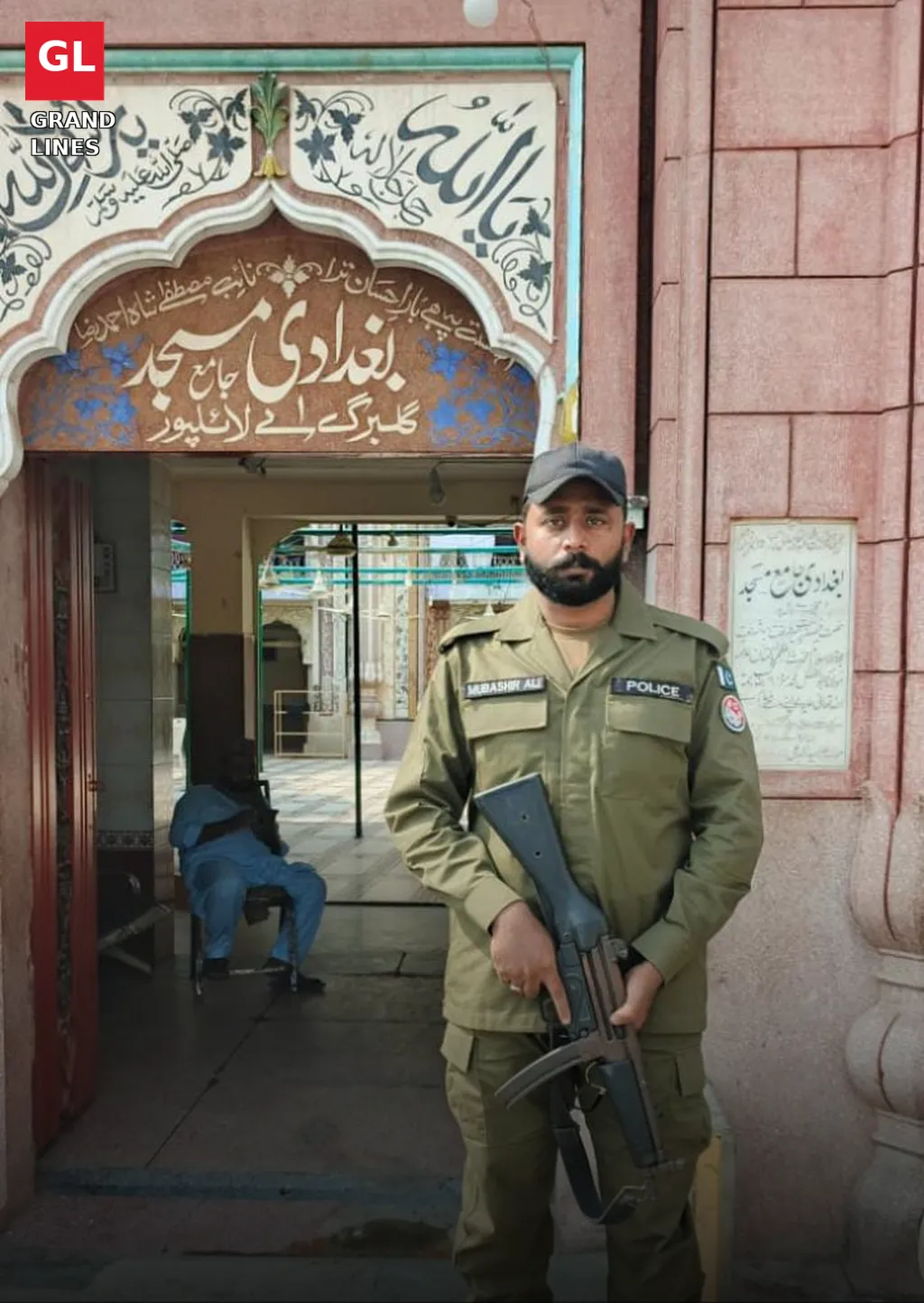 Police personnel deployed outside mosques in Faisalabad for Friday prayer security.