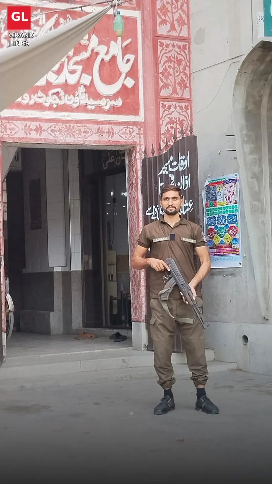 Police personnel deployed outside mosques in Faisalabad for Friday prayer security.