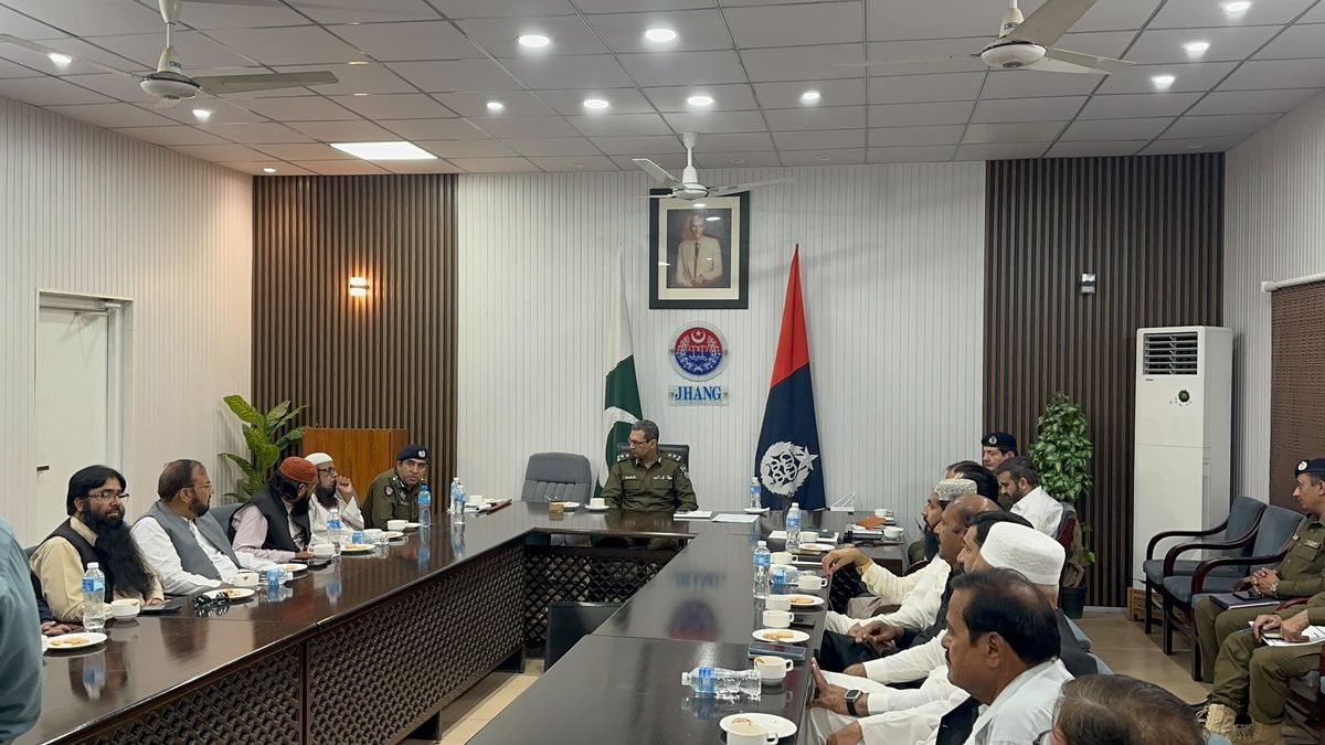 Peace committee members and police officers attend the meeting chaired by the RPO in Jhang