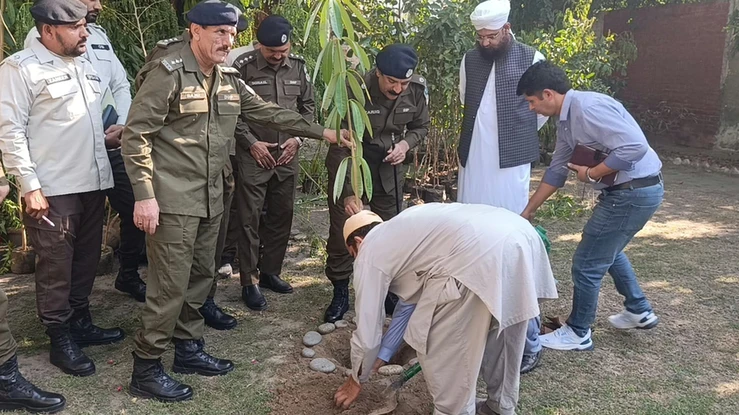 Patrolling Police Faisalabad charge: officer plants sapling at regional office. Patrolling Police Faisalabad charge: officer plants sapling at regional office.