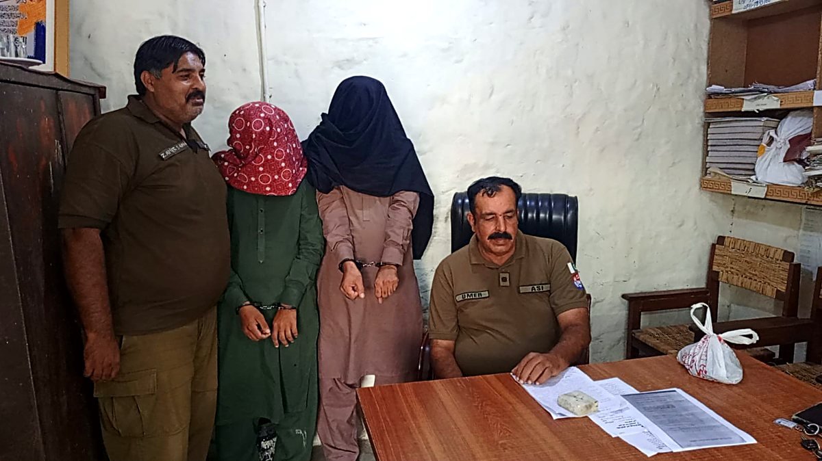 Two women suspects in custody at a Faisalabad police station