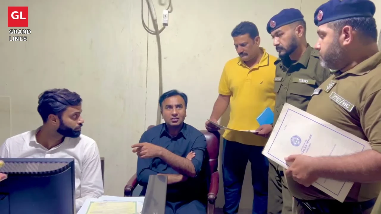 SSP Operations Imran Ahmad Malik chairs a review of pending work as officers stand by with files.