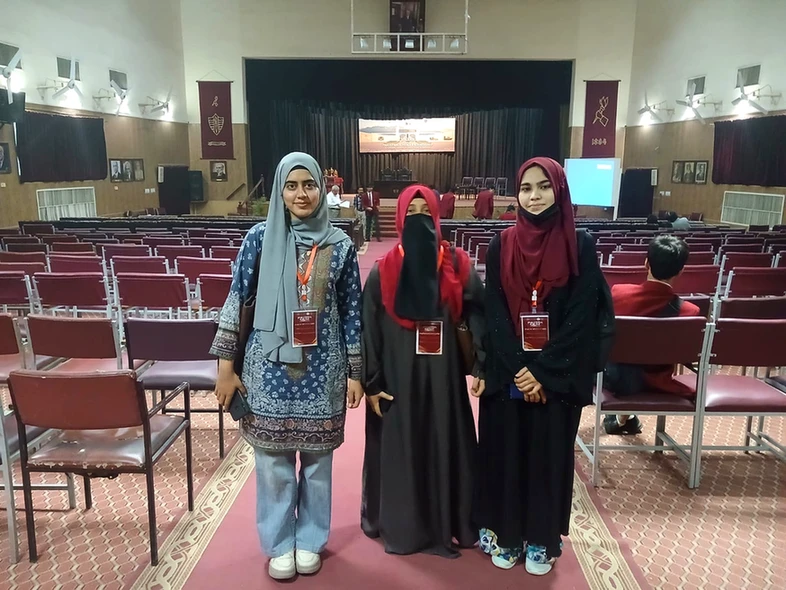 GCUF quiz team students pose in hall at Lahore competition. GCUF quiz team students pose in hall at Lahore competition.