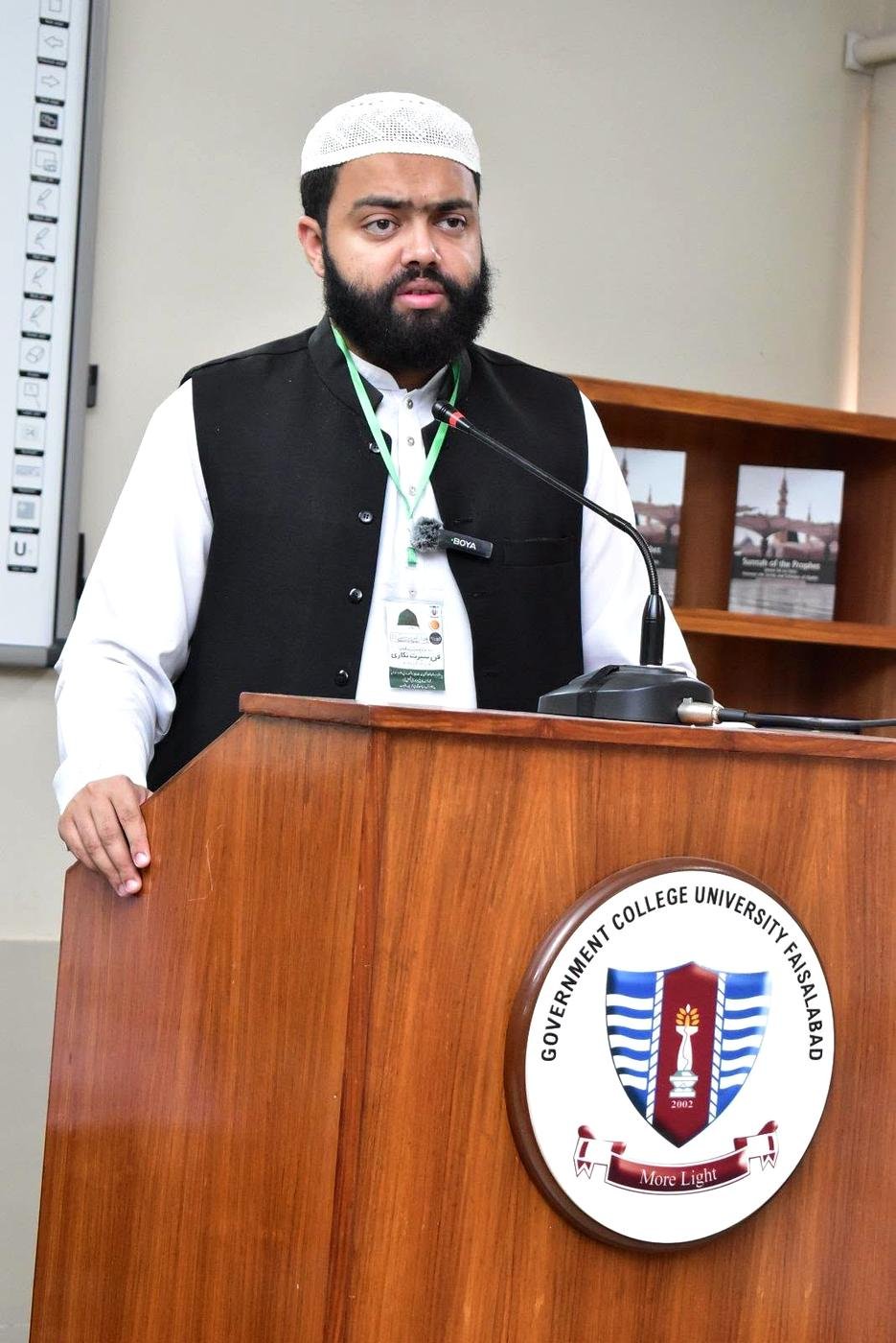 Speaker at the podium during the GCUF three-day Seerah writing workshop