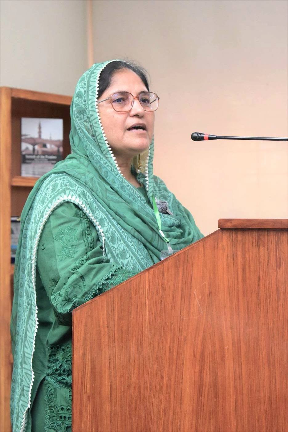 Woman speaker addressing the GCUF Seerah writing workshop