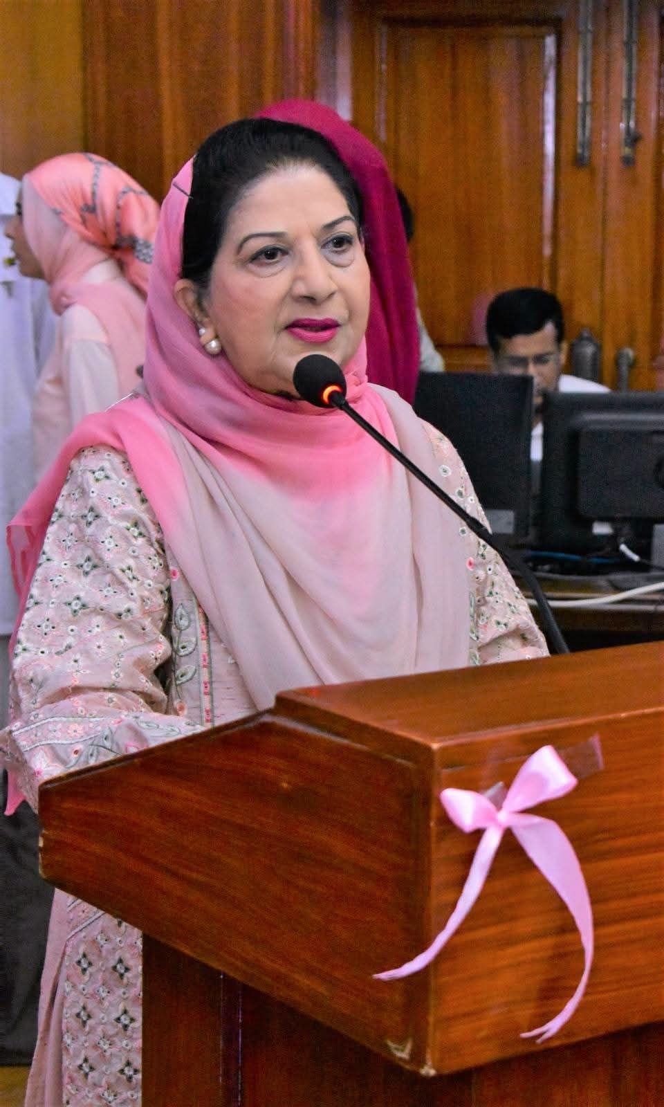 Speaker addressing GCUF breast cancer awareness symposium in Faisalabad