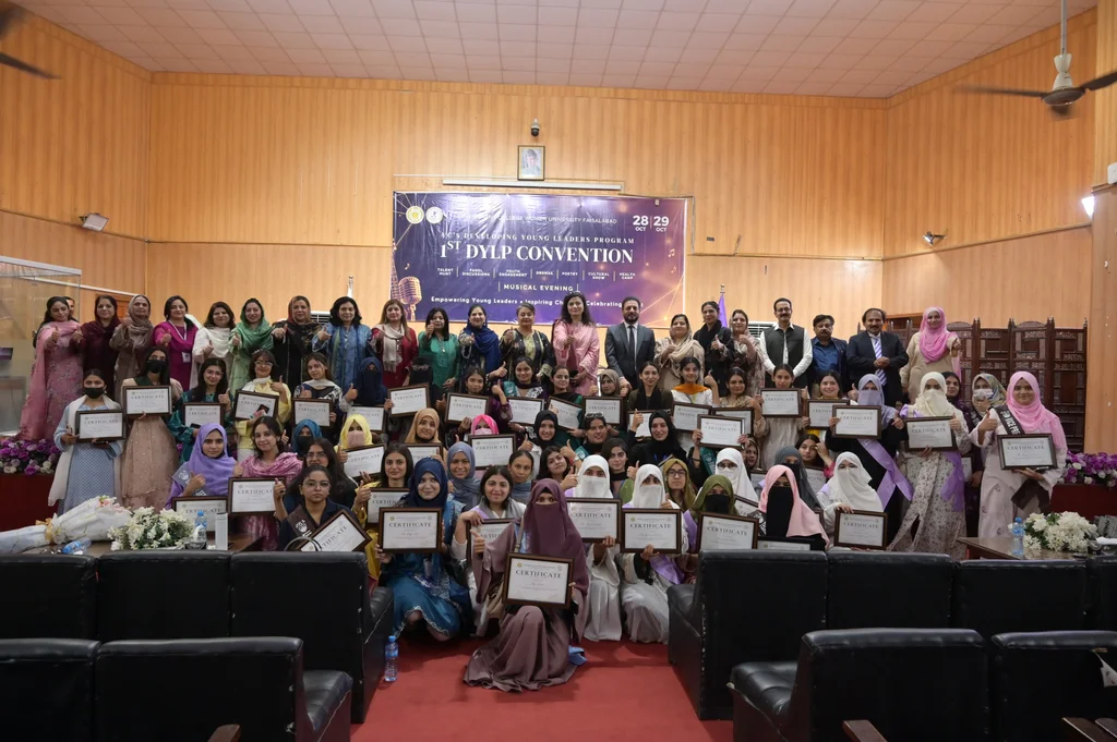 GCWUF students hold certificates at the close of the first DYLP convention in Faisalabad.