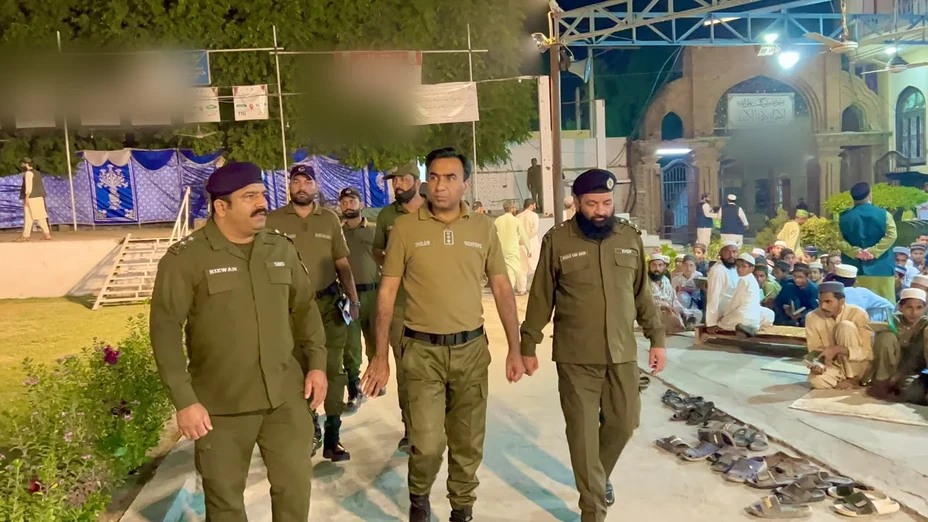 Police officers inspect training convention venue at Jamia Madrasa Darul Quran. Police officers inspect training convention venue at Jamia Madrasa Darul Quran.
