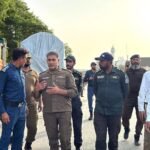 CTO Faisalabad Nasir Javed Rana with traffic police staff on road
