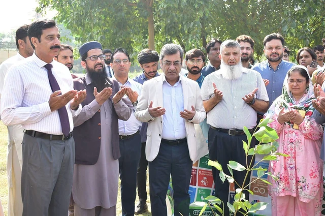 Participants during the plantation activity for World Sustainability Day at GCUF