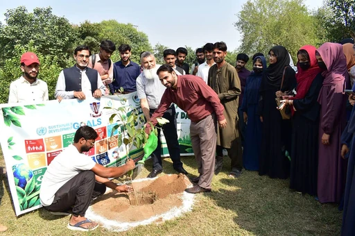 Participants during the plantation activity for World Sustainability Day at GCUF