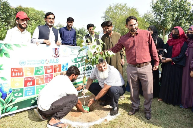 Participants during the plantation activity for World Sustainability Day at GCUF